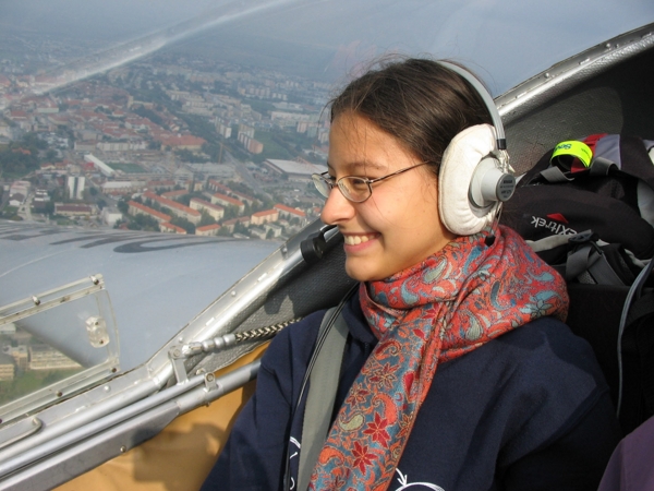 Flying a Vivat motor glider over Trnava, Slovakia, with a huge smile.